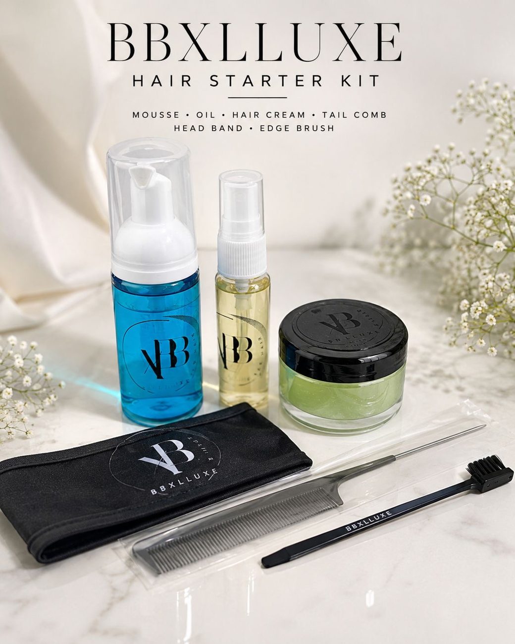BBxLLuxe Hair Starter Kit flatlay — mousse, oil, hair cream, tail comb, head band, and edge brush on marble